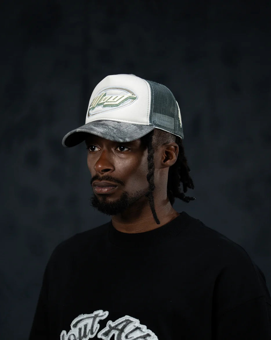 C054 - CAMO TRUCKER CAP